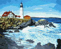 Скалистый берег и дом с маяком